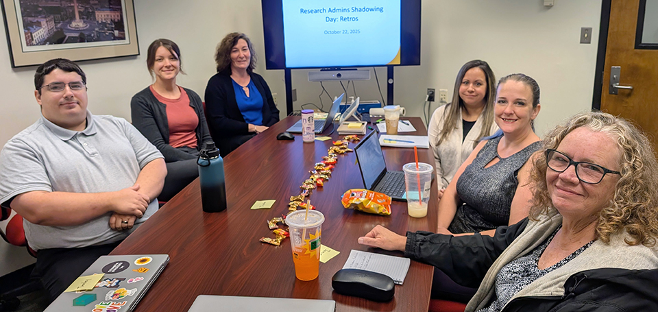 Research Admins Shadowing Day at the Office of Contract and Grant Accounting. From left to right around the table, Justin Hopkins, Tenley Stewart, Kathleen Browning, Mary Ann Scott, Debbie Bright, and Janis Rainer.