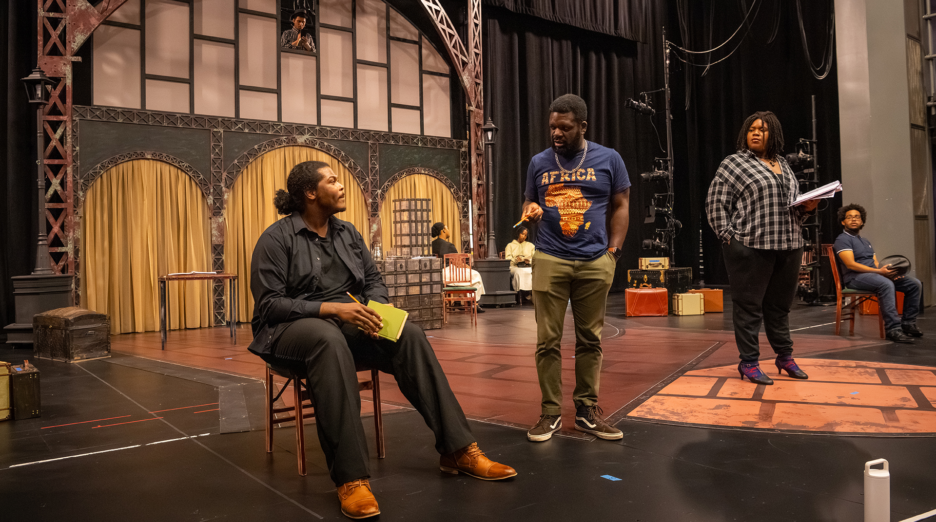 Director Gerrad Alex Taylor works with the cast of "Shakespeare in Harlem."